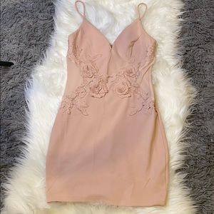 Bodycon dress with rose and sheer detail